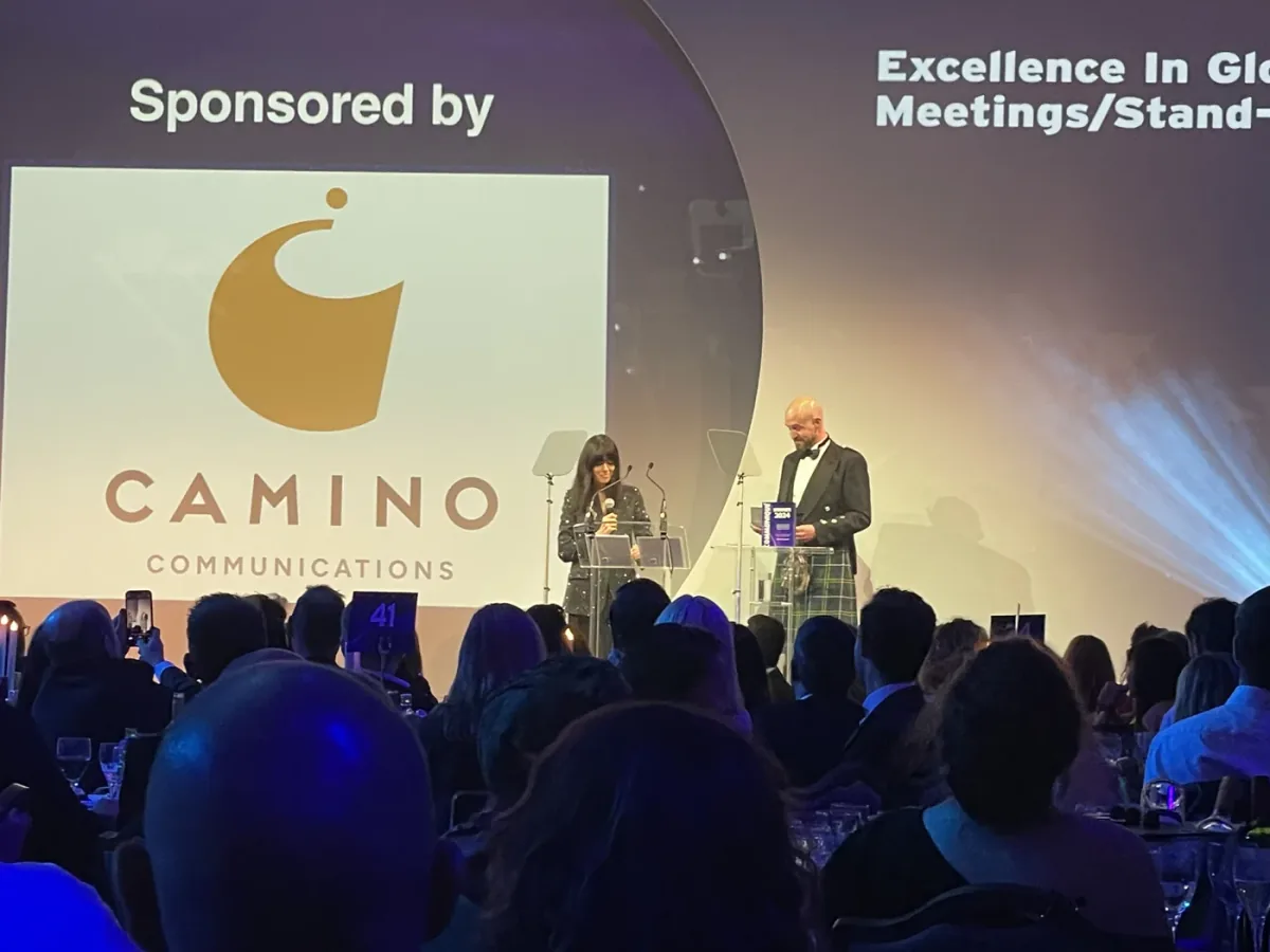 James Turnbull on stage at a healthcare communications awards event